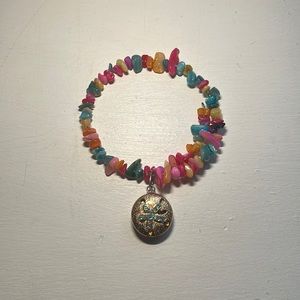 A colorful Bracelet with a charm
